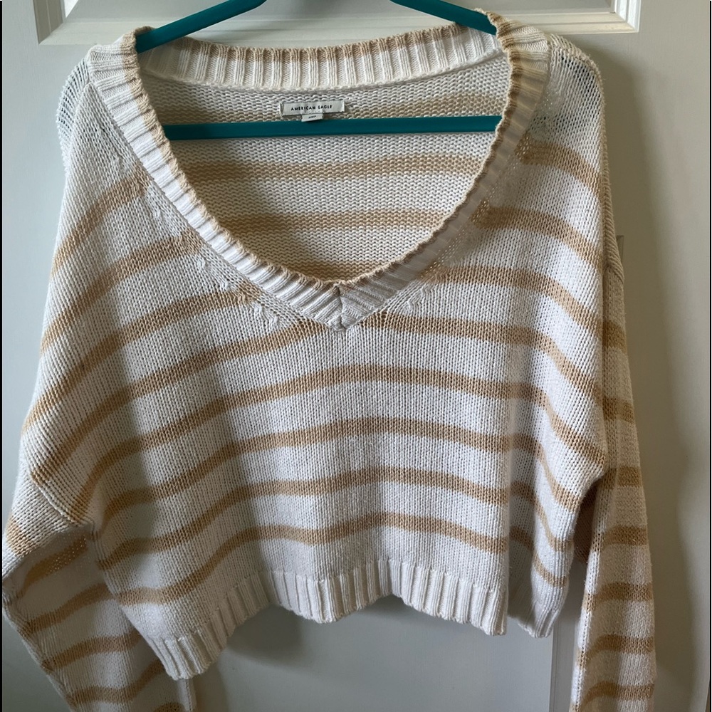 yellow and white striped american eagle sweater 
size L